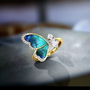 Anthropologie Gold Ring with Blue and White Butterfly Design
